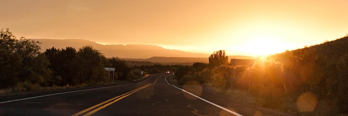 Photo of the sunset and the road